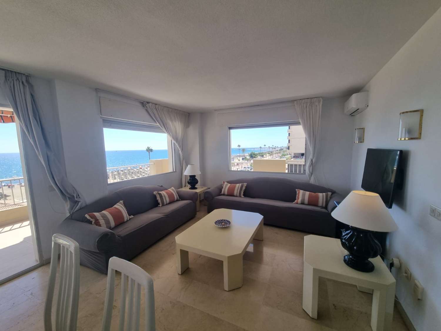 HALF SEASON FOR RENT FROM NOW ON -30.6.25 NICE CORNER APARTMENT ON THE 1ST LINE WITH BEAUTIFUL SEA VIEWS IN FUENGIROLA