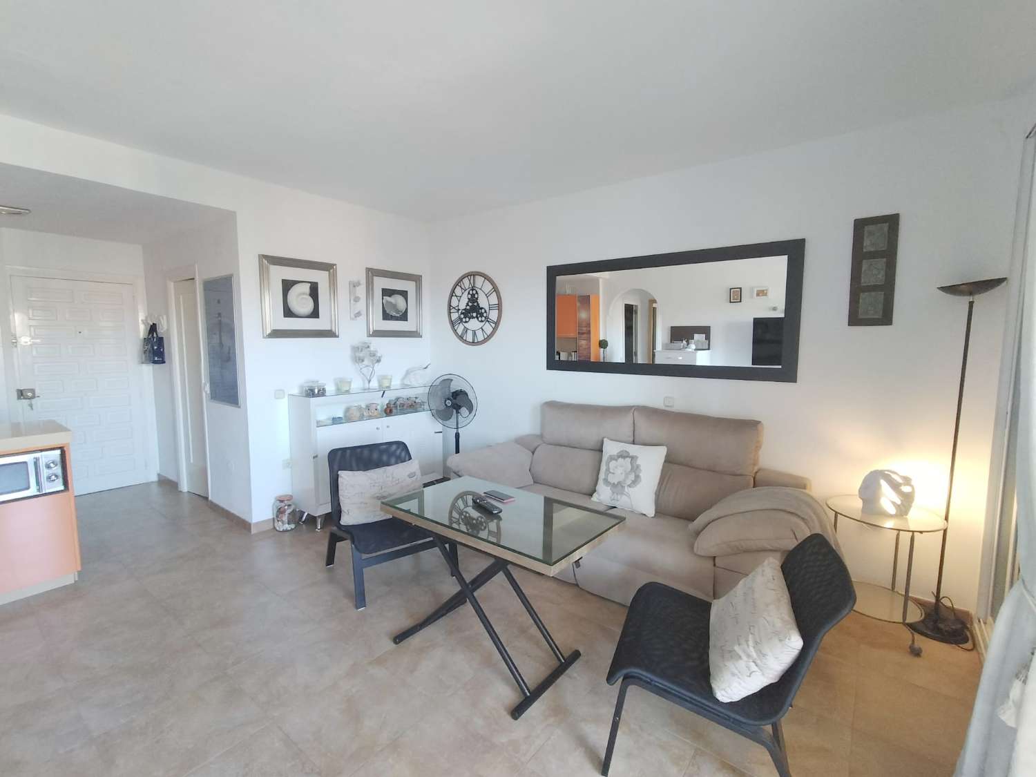 APARTMENT WITH SEA VIEWS FOR SALE IN BENALMADENA ON THE 1ST LINE OF THE BEACH