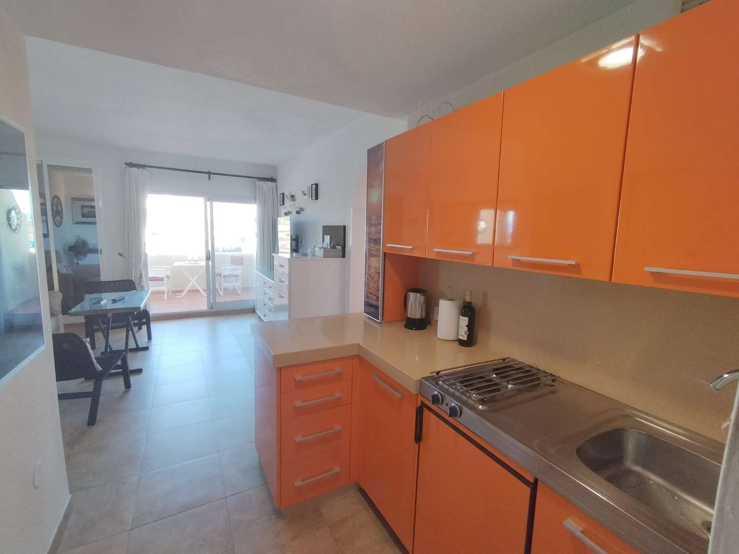 APARTMENT WITH SEA VIEWS FOR SALE IN BENALMADENA ON THE 1ST LINE OF THE BEACH