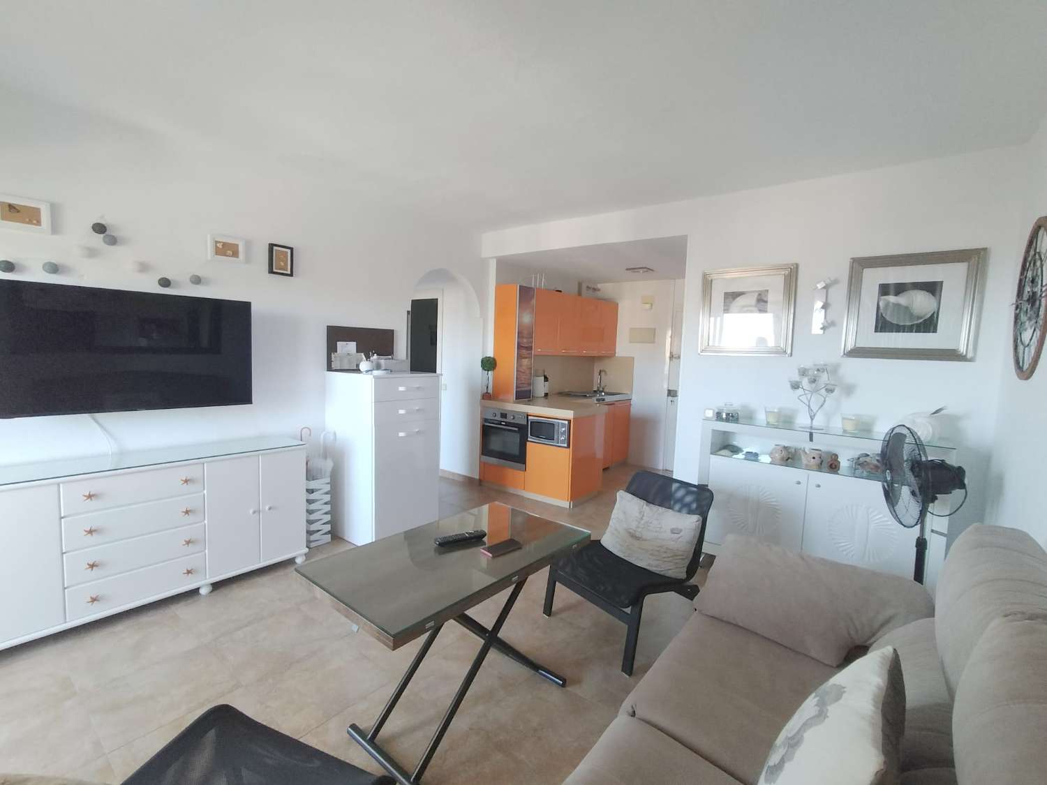 APARTMENT WITH SEA VIEWS FOR SALE IN BENALMADENA ON THE 1ST LINE OF THE BEACH