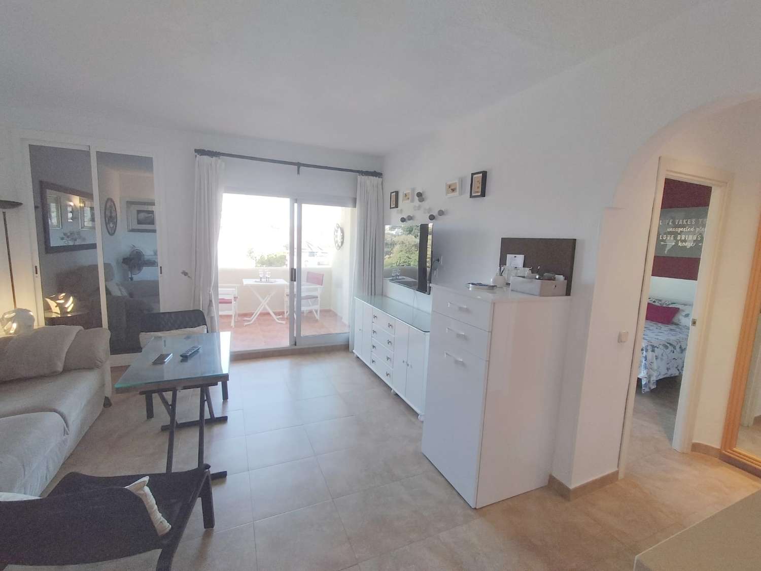 APARTMENT WITH SEA VIEWS FOR SALE IN BENALMADENA ON THE 1ST LINE OF THE BEACH